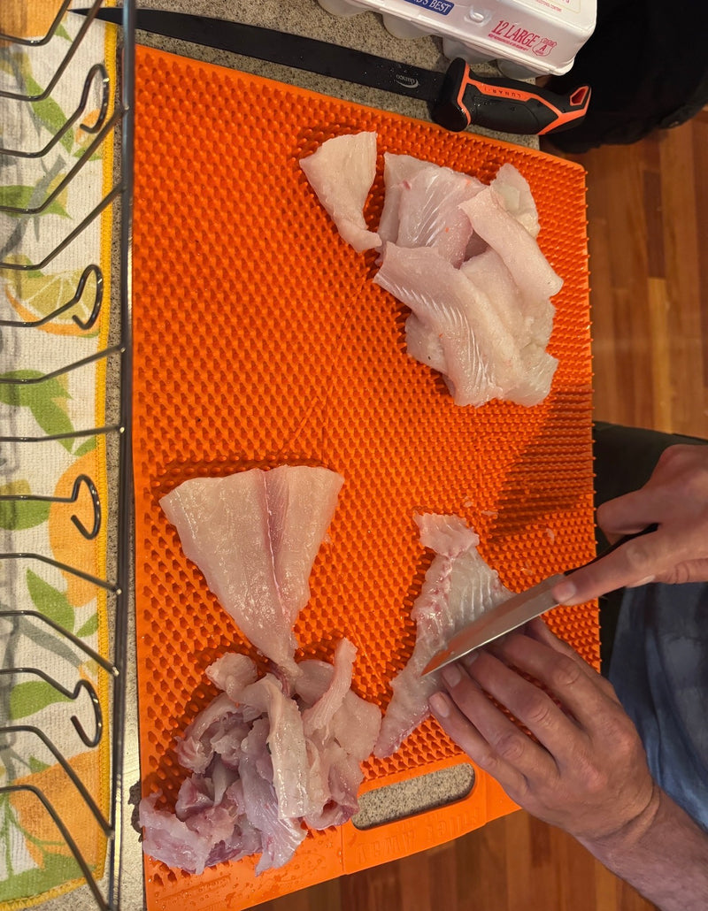 Load image into Gallery viewer, Orange Fillet Away Fish Fillet Mat | Non Slip Fish Cleaning Mat
